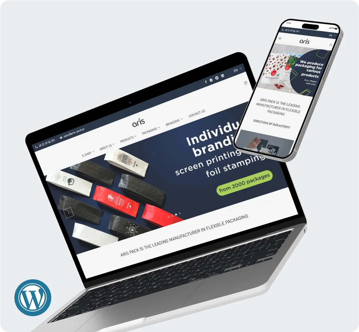 Overhead view of a MacBook and iPhone displaying a website for 'aris', a company specializing in individual brand screen printing and foil stamping, with a WordPress icon indicating the content management system used.