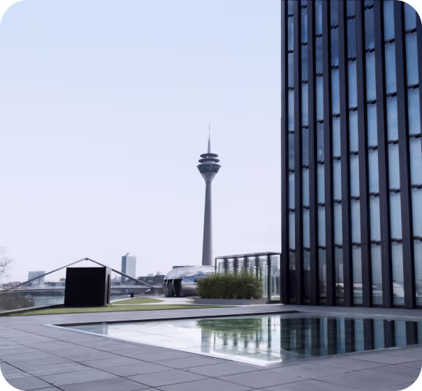 Scenic view of Düsseldorf's iconic Rheinturm tower and modern architecture at the Media Harbor, symbolizing innovation and digital growth, captured from marketer UX's vibrant headquarters.